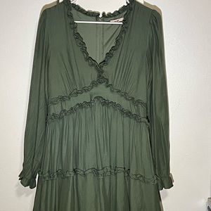 Sage green dress with long sleeves and low cut. Size large.